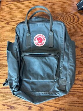 Fjallraven Kanken Classic Backpack in Olive with Red Logo